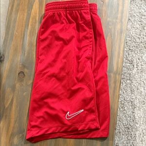 Nike Red Kids Athletic Shorts with White Swoosh